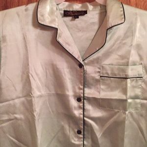 Four sets of pajamas (green, blue, red & ivory).